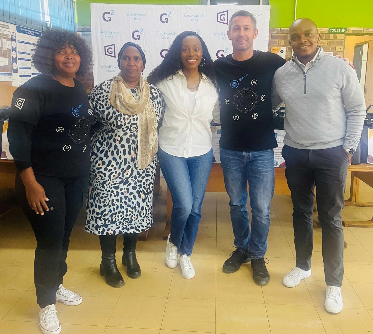 Learners at Ikusasa Comprehensive School in Tembisa, Kempton Park, recently received 50 full winter school uniforms donated by the employees of Growthpoint Properties with the non-profit organisation Threads for iKasi. Handing over the uniforms are, from left: Rebecca Kekana of Growthpoint, Oliver Maweneng of Ikusasa Comprehensive School, Threads for iKasi Founder and CEO Khabonina Mnguni, Michael Potgieter of Growthpoint and Threads for iKasi Foundation sponsor Obakeng Pitse